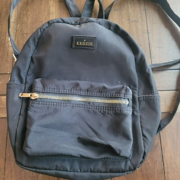 Kedzie Black Mini Backpack With Gold Zipper & Patterned Interior - Picture 1 of 5